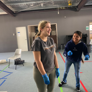 students are happy and laughing at a first aid course